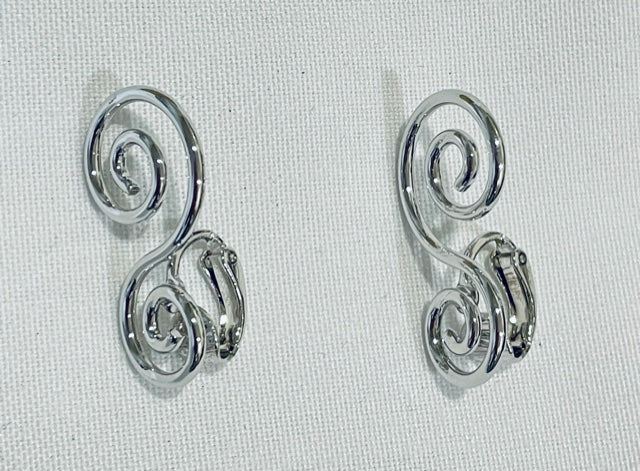 NEW AVON Vintage Gorgeous Silver tone Spun Swirls Clip Earrings 1977